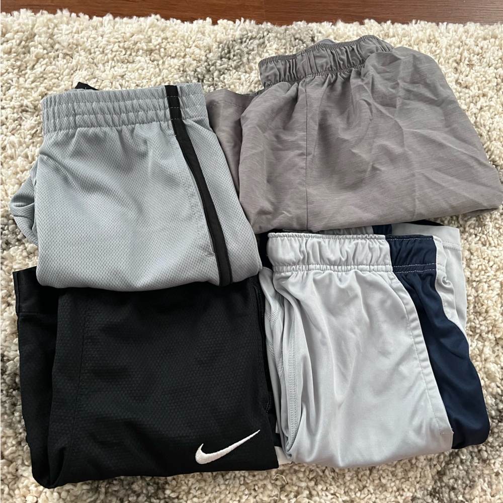 Bundle 4 Nike and champion boy shorts size L